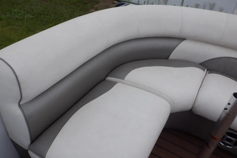Slide: The Image of 2019 Premier 220 SunSation boat seating with gray and white upholstery. - 37