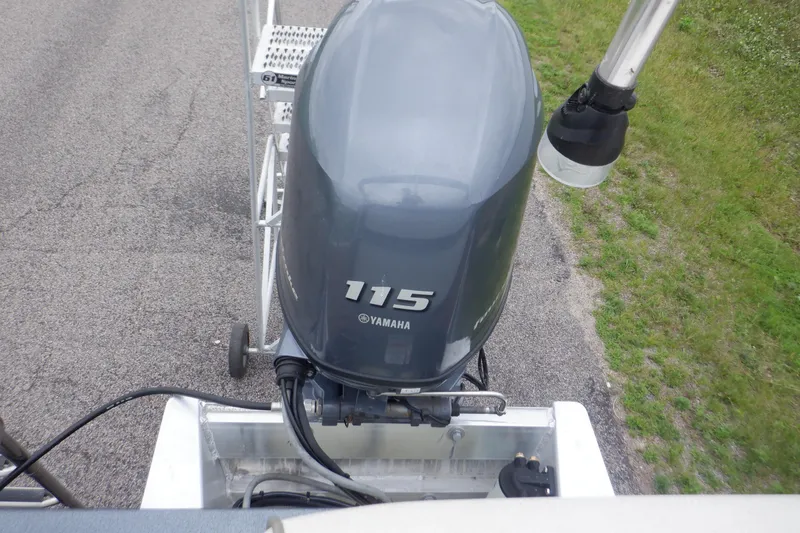 Slide: The Image of 2019 Premier 220 SunSation with Yamaha 115 outboard motor on a trailer. - 39