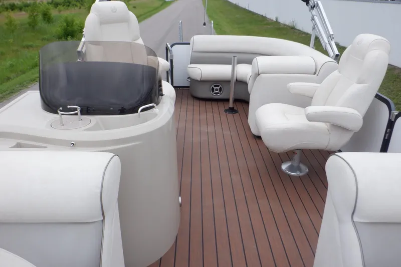 Slide: The Image of 2019 Premier 220 SunSation pontoon boat with luxurious seating and sleek design. - 45