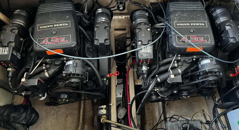 Slide: The Image of Twin Volvo Penta 4.3GL engines in a 1998 Regal Commodore 2760 boat. - 11
