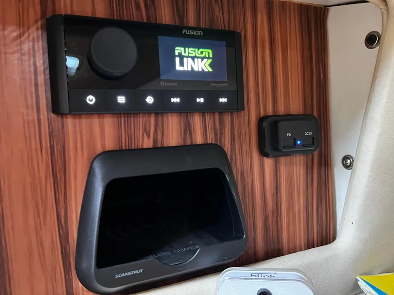 Slide: The Image of Control panel with Fusion Link system in 1998 Regal Commodore 2760 boat interior. - 8