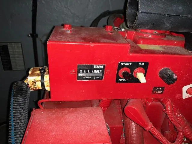 Slide: The Image of Control panel of a 2001 Sea Ray 380 Sundancer boat engine. - 27