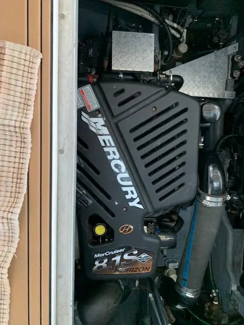 Slide: The Image of Engine compartment of a 2001 Sea Ray 380 Sundancer with Mercury MerCruiser 8.1S Horizon. - 30