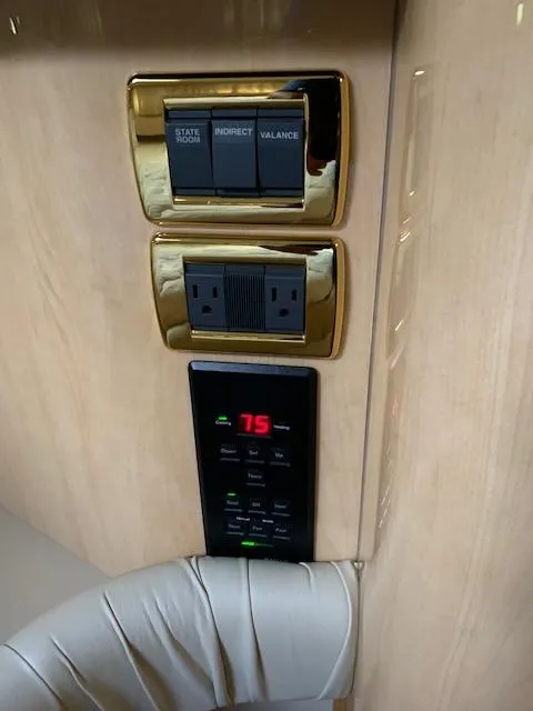 Slide: The Image of Control panel and outlet on 2001 Sea Ray 380 Sundancer yacht interior. - 47