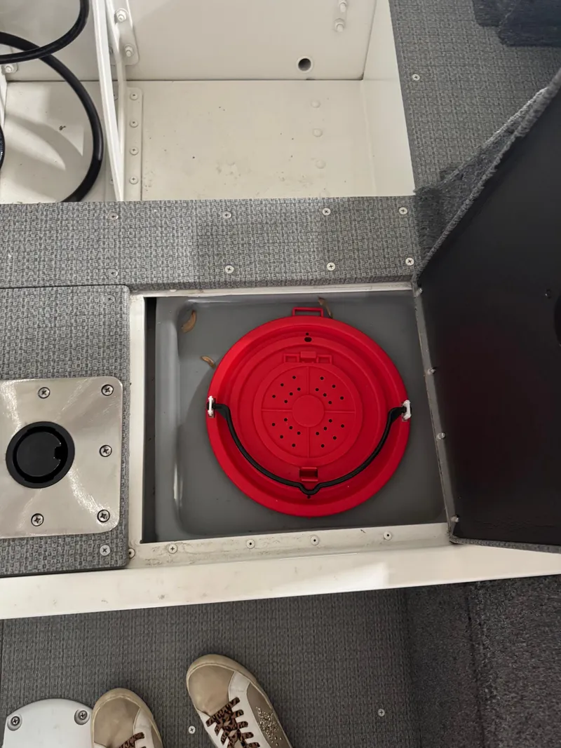 Slide: The Image of Open compartment with red lid in G3 AV17C Vinyl boat, 2024 model. - 4