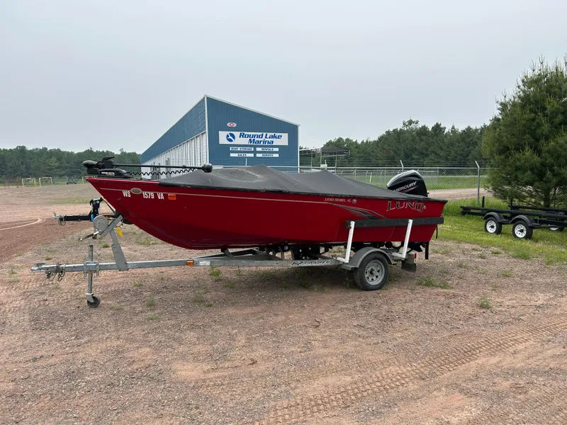 The Image of 2023 Lund 1650 Rebel XL Sport boat on trailer at Round Lake Marina. - 0