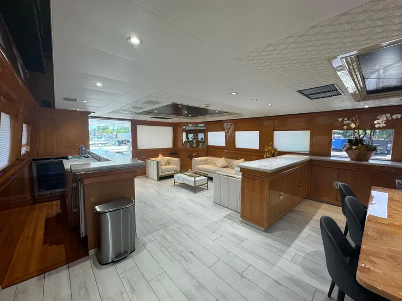 Slide: The Image of Luxurious interior of 2000 Baglietto 116 yacht with modern kitchen and seating area. - 5