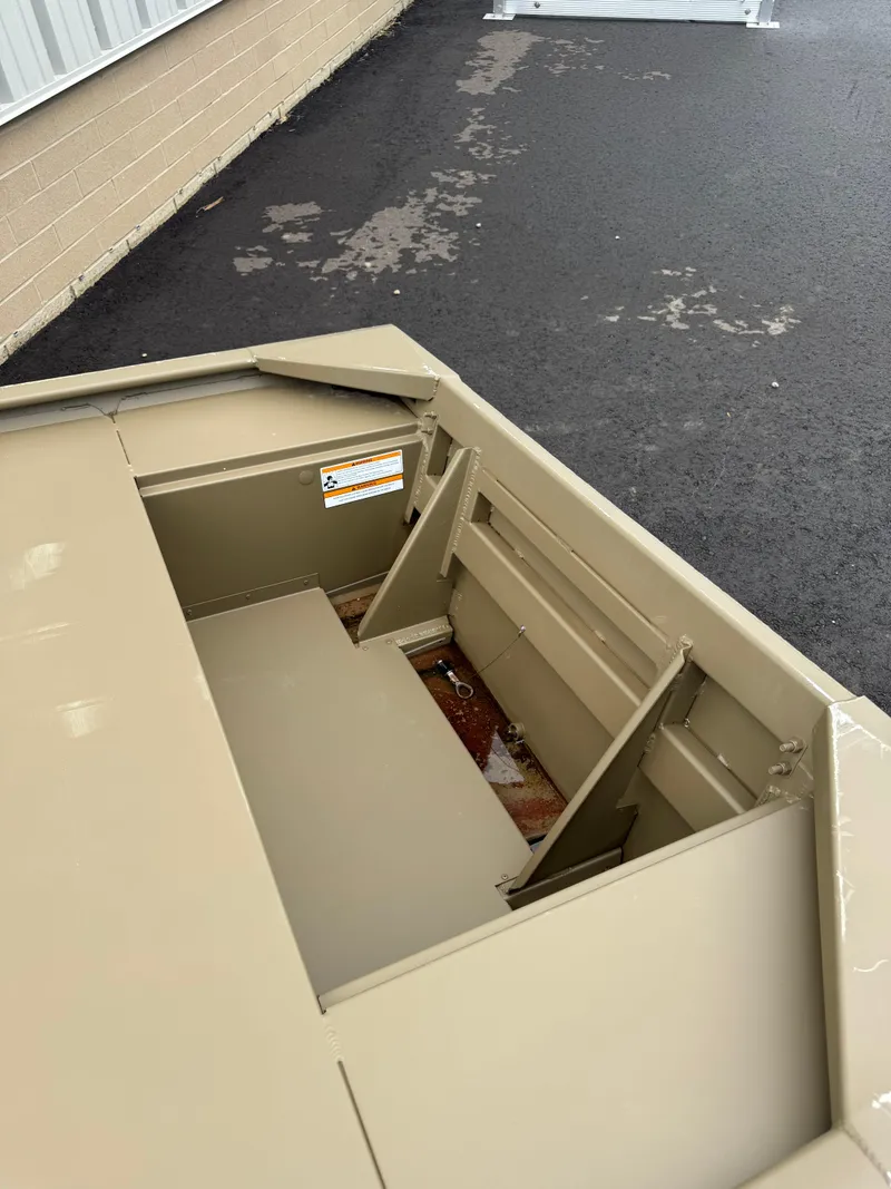 Slide: The Image of 2025 G3 1852 WSOF boat interior, beige color, on asphalt surface. - 2