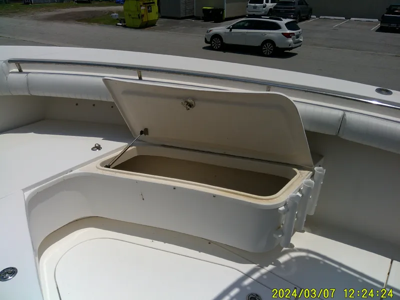 Slide: The Image of Open storage compartment on 2006 McKee Craft FREEDOM TE 28 boat deck. - 21