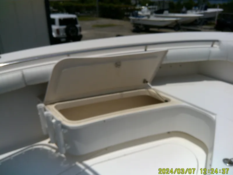 Slide: The Image of Open storage compartment on 2006 McKee Craft FREEDOM TE 28 boat deck. - 22