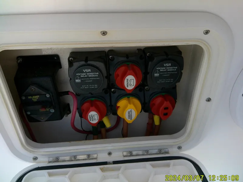 Slide: The Image of Electrical panel of a 2006 McKee Craft FREEDOM TE 28 boat with VSR modules. - 27