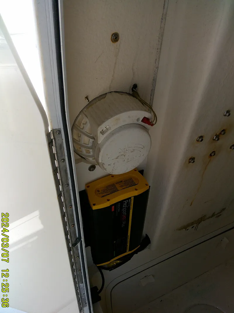 Slide: The Image of 2006 McKee Craft FREEDOM TE 28 interior with electrical components and wiring. - 32