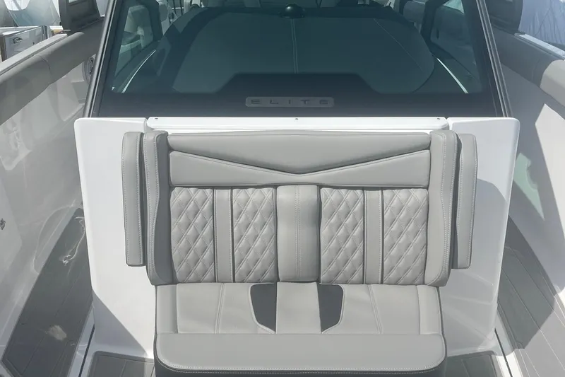 Slide: The Image of 2026 Monterey Elite 30 OB dashboard with steering wheel and Simrad display. - 8