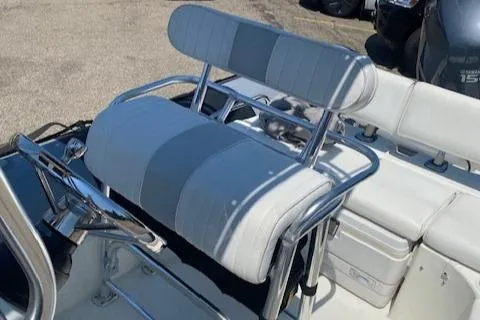 Slide: The Image of 2011 Zodiac Pro Open 650 boat seat with gray and white upholstery. - 9