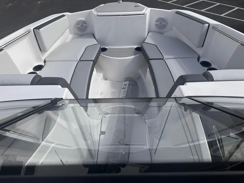 Slide: The Image of 2025 Yamaha Boats AR220 interior with sleek seating and modern design. - 12
