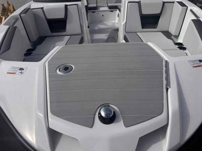 Slide: The Image of 2025 Yamaha Boats AR220 interior with sleek seating and modern design. - 30