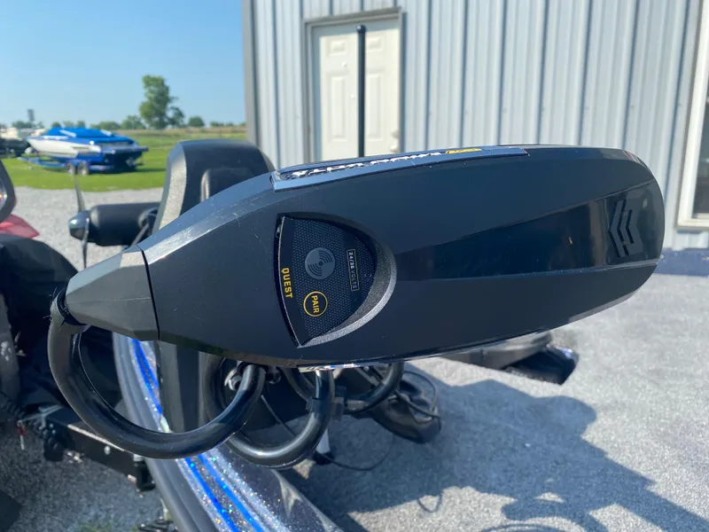 Slide: The Image of 2026 Phoenix 921 2 Elite X boat motor close-up, outdoors near a metal building. - 6