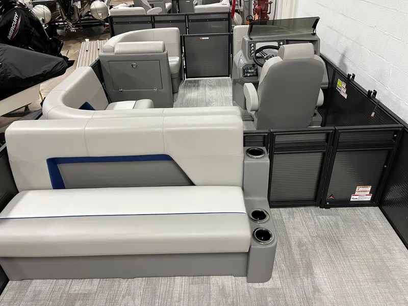 Slide: The Image of Interior of 2025 Qwest 8516 Lanai pontoon boat with modern seating and helm. - 3