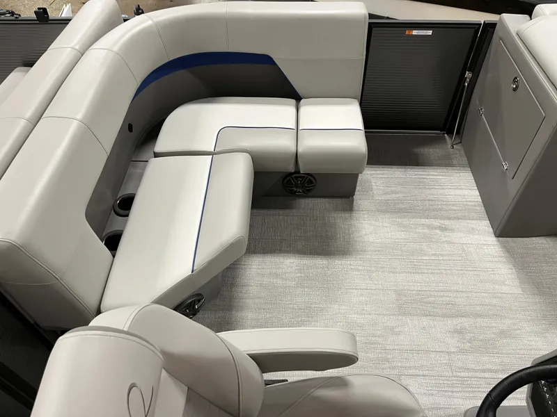 Slide: The Image of 2025 Qwest 8516 Lanai boat interior with gray seating and modern design. - 5