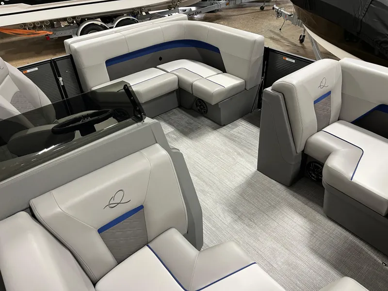 Slide: The Image of Interior of 2025 Qwest 8516 Lanai boat with luxurious seating and modern design. - 7