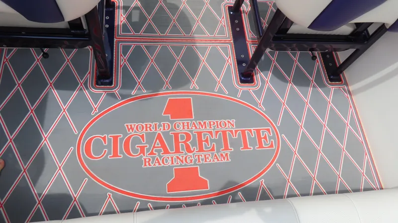 Slide: The Image of Floor of 2005 Cigarette 38 Top Gun boat with racing team logo. - 10