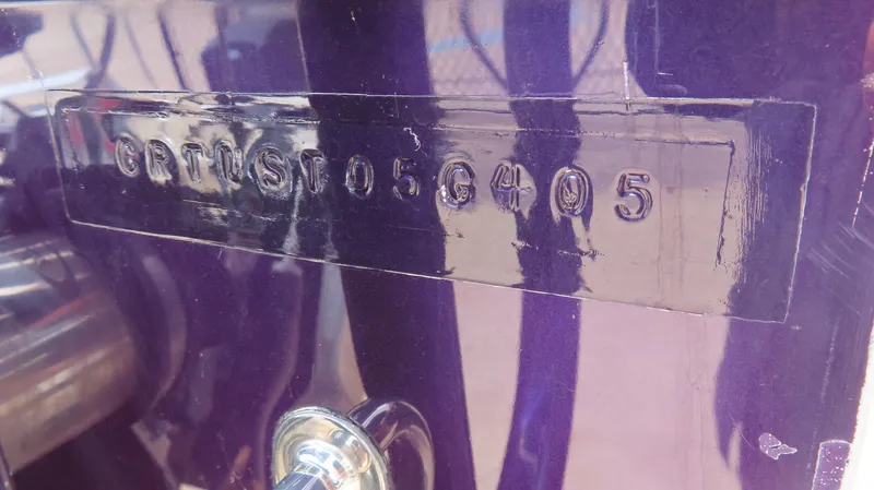 Slide: The Image of Hull identification number on a 2005 Cigarette 38 Top Gun boat. - 14