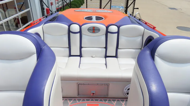 Slide: The Image of 2005 Cigarette 38 Top Gun boat interior with white and purple seating. - 23