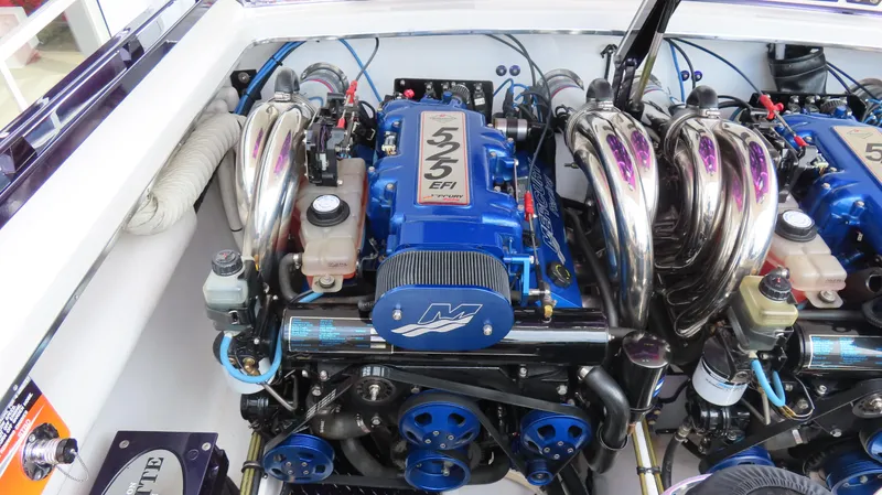 Slide: The Image of 2005 Cigarette 38 Top Gun engine compartment with dual Mercury 525 EFI engines. - 25