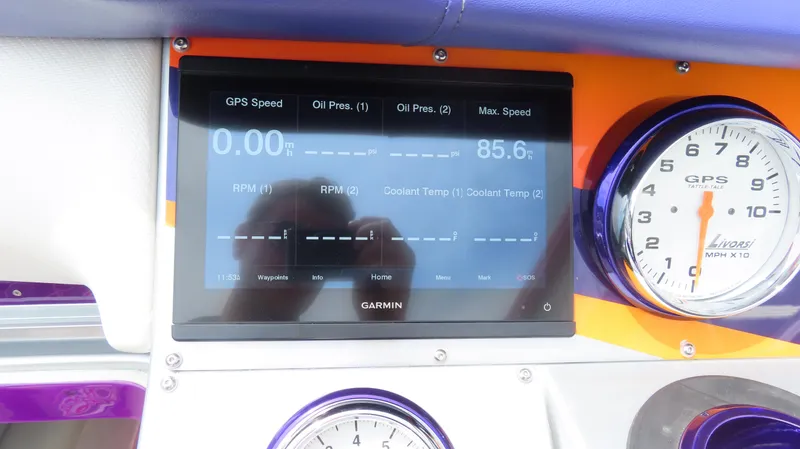Slide: The Image of Dashboard of a 2005 Cigarette 38 Top Gun boat with Garmin GPS display. - 5