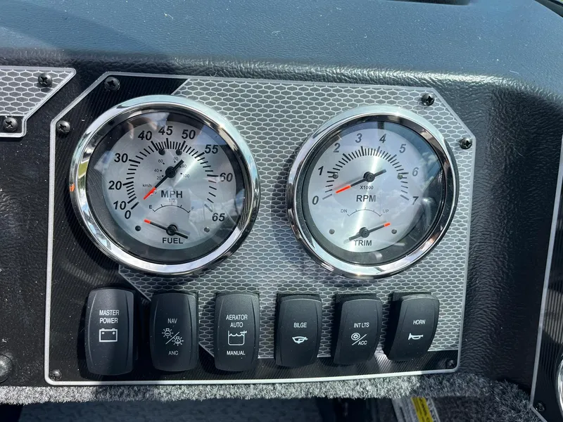 Slide: The Image of Dashboard of 2026 Lund 1775 Adventure Sport with speedometer and RPM gauges. - 17
