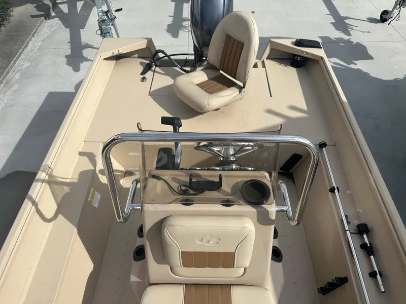 Slide: The Image of 2024 G3 Bay 17 boat interior with steering console and seating. - 12