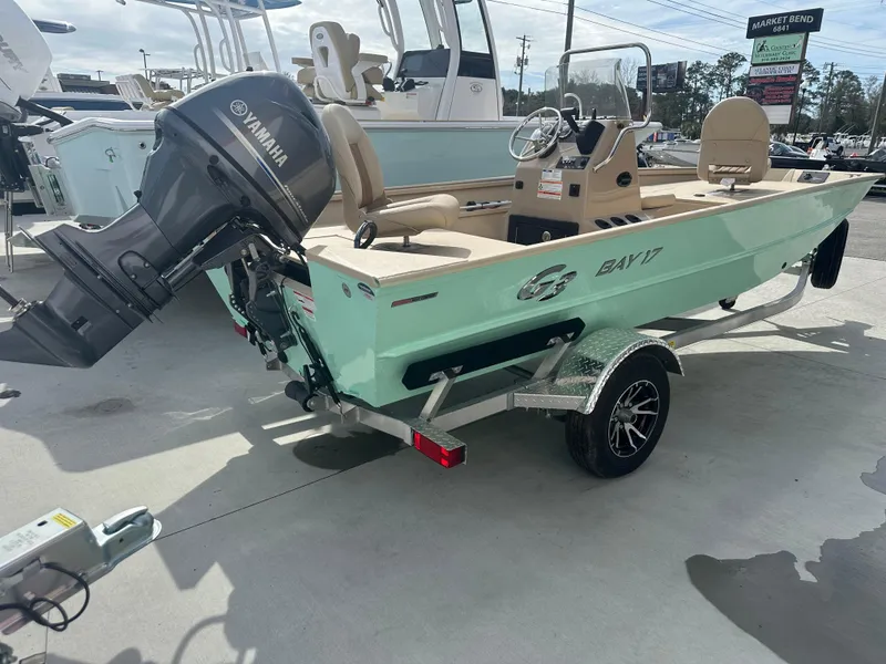 Slide: The Image of 2024 G3 Bay 17 boat with Yamaha outboard motor on trailer. - 4
