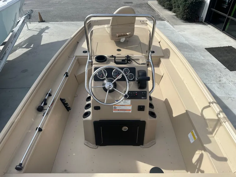 Slide: The Image of 2024 G3 Bay 17 boat interior with steering console and seating. - 8