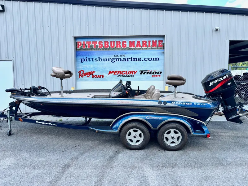 Slide: The Image of 2000 Ranger 518VX Comanche boat with Mercury engine at Pittsburg Marine dealership. - 0