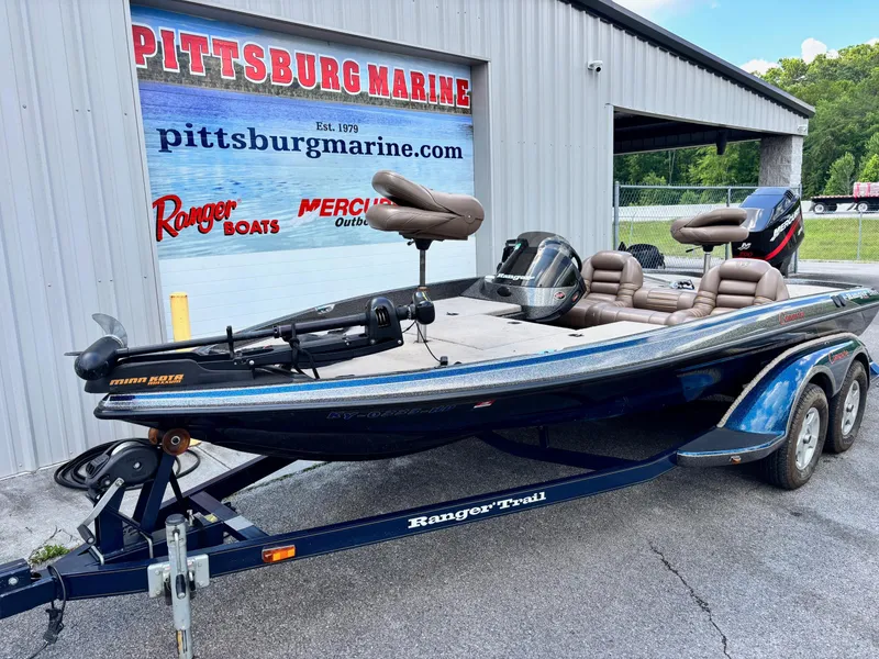 Slide: The Image of 2000 Ranger 518VX Comanche boat at Pittsburg Marine dealership. - 1