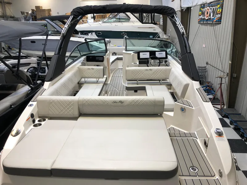 Slide: The Image of 2025 Sea Ray SDX 270 boat interior with luxurious seating and modern design. - 3