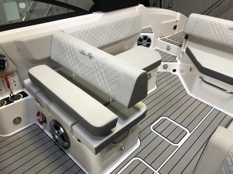 Slide: The Image of 2025 Sea Ray SDX 270 boat interior with luxurious seating and modern design. - 6