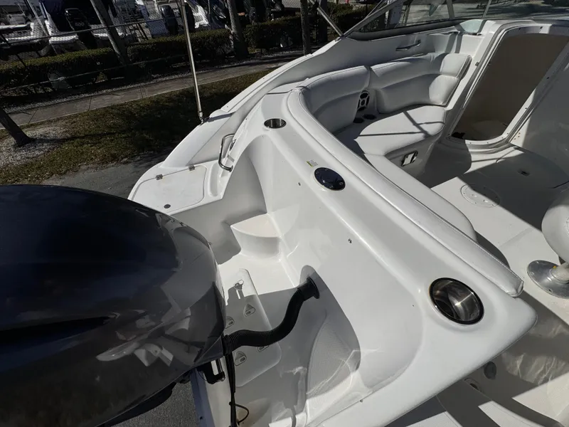 Slide: The Image of 2017 Hurricane 2000SD boat interior with seating and engine view. - 15