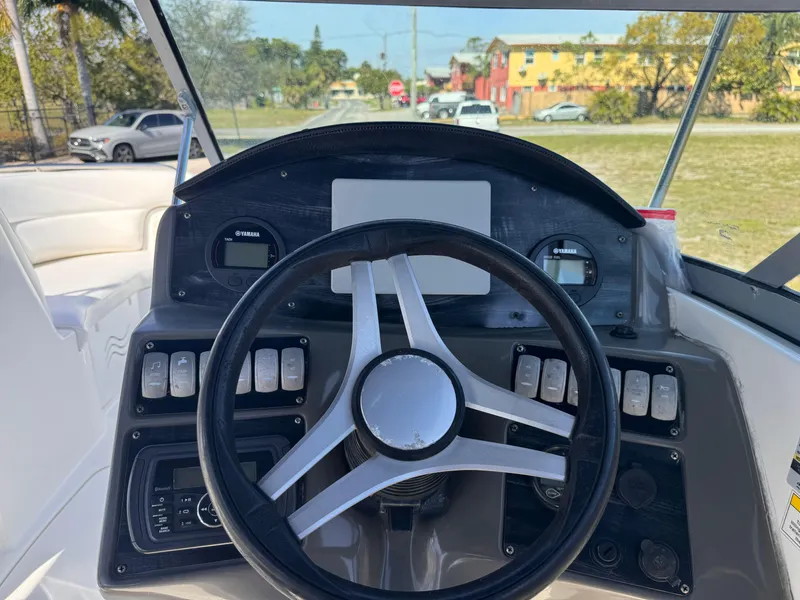 Slide: The Image of Steering console of a 2017 Hurricane 2000SD boat with Yamaha gauges. - 18