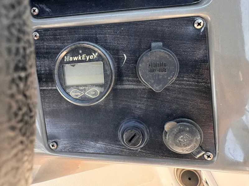 Slide: The Image of Hurricane 2000SD 2017 dashboard with HawkEye depth gauge and audio auxiliary input. - 23