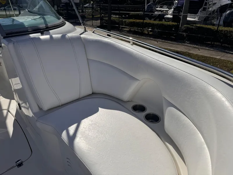 Slide: The Image of White leather seating on a 2017 Hurricane 2000SD boat with cup holders. - 35