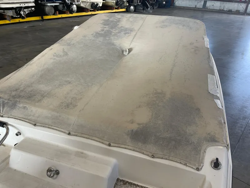 Slide: The Image of Dusty cover on a 1993 Regal 176 SE boat in storage. - 5