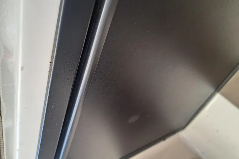 Slide: The Image of Close-up of a 2003 Carolina Classic 28 Express Sportfisherman interior detail. - 20