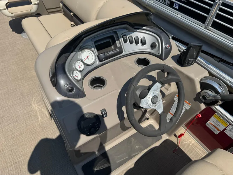 Slide: The Image of Steering console of 2021 Sun Tracker Fishin' Barge 20 DLX pontoon boat. - 10