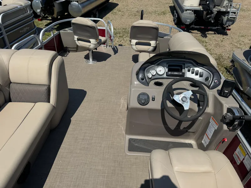 Slide: The Image of 2021 Sun Tracker Fishin' Barge 20 DLX interior with steering console and seating. - 15