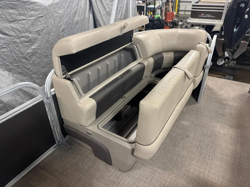 Slide: The Image of 2021 Sun Tracker Party Barge 20 DLX with open storage compartments. - 12