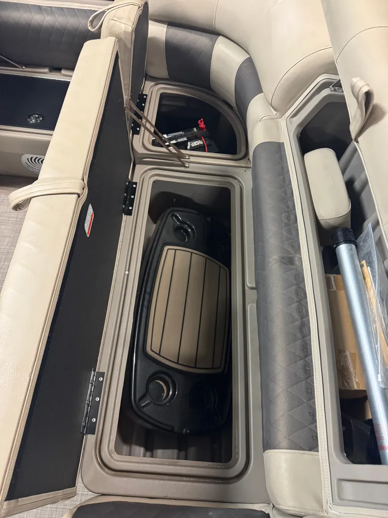 Slide: The Image of Interior storage compartments of a 2021 Sun Tracker Party Barge 20 DLX pontoon boat. - 11