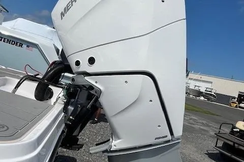 Slide: The Image of 2026 Monterey 275 Super Sport boat with powerful outboard motor, docked outdoors. - 10