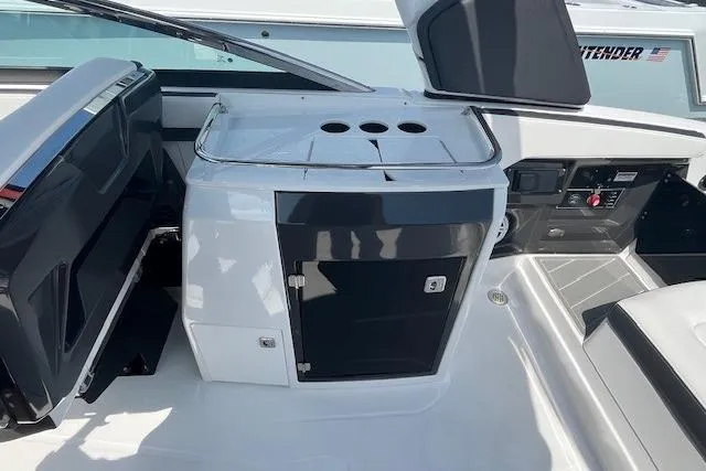 Slide: The Image of 2026 Monterey 275 Super Sport boat interior with compact bathroom and modern fixtures. - 11
