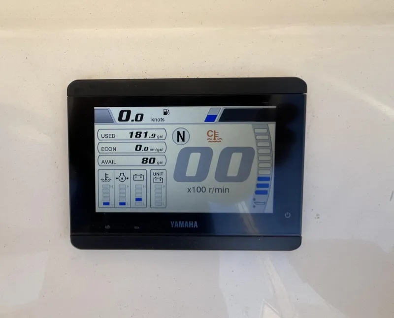 Slide: The Image of Digital display on 2024 Jones Brothers Cape Fisherman 26, showing fuel and speed metrics. - 7